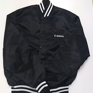 Canon black nylon jacket w cotton lining.